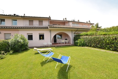 Terraced house with large garden.