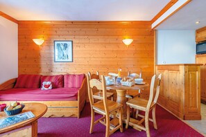 Prepare meals in the kitchenette and enjoy them at the dining table.