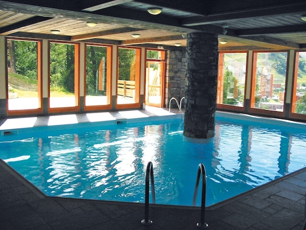 Swim laps in the indoor pool.