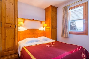 The bedroom may feature a variety of bedding options - please specify your preferences with our team!