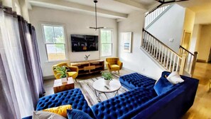 Utilize the living room lounge to plot and scheme your evening activities! 