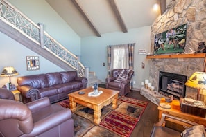Main Level Living Room with Gas Log Fireplace and HD Smart TV