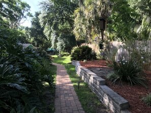 Take the walkway to the large Koi pond with 8 15+ year old koi.