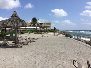 Beach chairs and loungers as well as tiki huts and cabanas