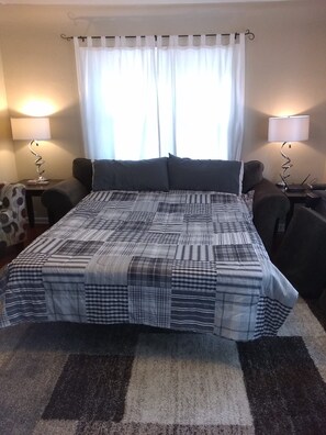 Linens and pillows for Sofa sleeper are in the cabinet under the TV
