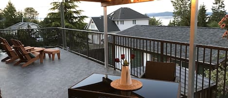 Covered deck with lights and oceanview