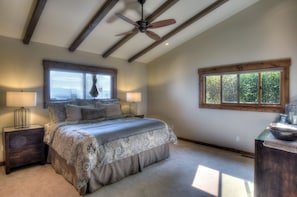 Master bedroom: King bed with lake view