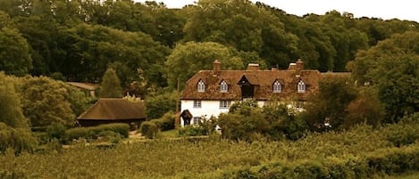 The cottage is the left hand set of windows of Heart's Delight Farm