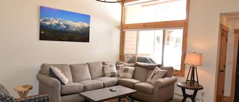 Beautiful Living Room - Beautiful and spacious living room with a large smart TV.