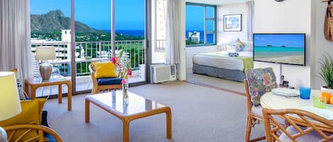 An overview of your living room, dining area, and bedroom with great Ocean and Diamond Head Views!