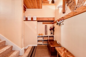 Entryway with endless coat hooks + shoe storage