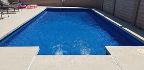 Large sparkling swimming pool. Estate sized corner lot. Huge backyard area. 