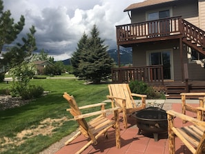 Fire pit with views of Red Lodge Mountain in the background at San Souci