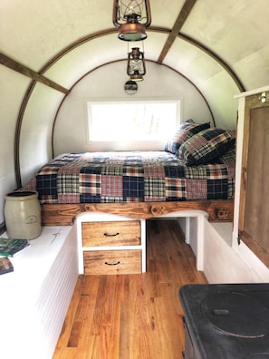 inside view of sheepherder wagon. Off grid but nice and cozy!