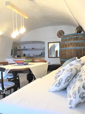 The living room (old winery) and the kitchen