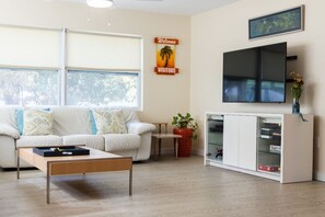 Smart TV allows for streaming. Wifi and cable TV included.