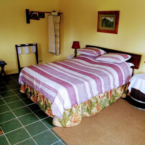 Cottage ' Wood' , Queen sized bed, en suite with private balcony.