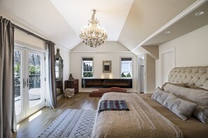 Master bedroom with 10 foot electric fireplace 
