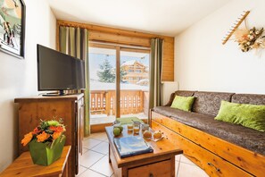 Welcome to our charming and rustic apartment in Les Saisies!