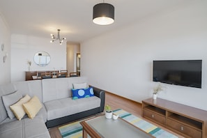 Salle de séjour avec TV