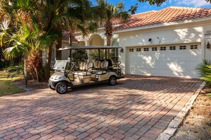 Front paver driveway for parking and add the 6-seater golf cart.