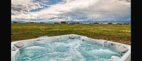 Soak away stress and worries in the hot tub as you soak in the gorgeous views surrounding you