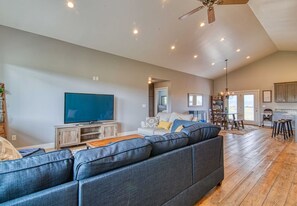 Large open living area with TV.