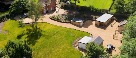 View of garden, outbuildings are locked, old pigsties, garage except cob house