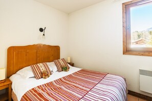 Drift to sleep in this plush Double bed in the master bedroom.