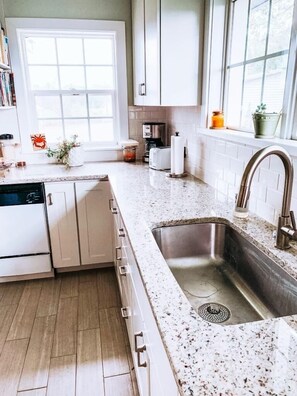 Modern tile and granite countertops.