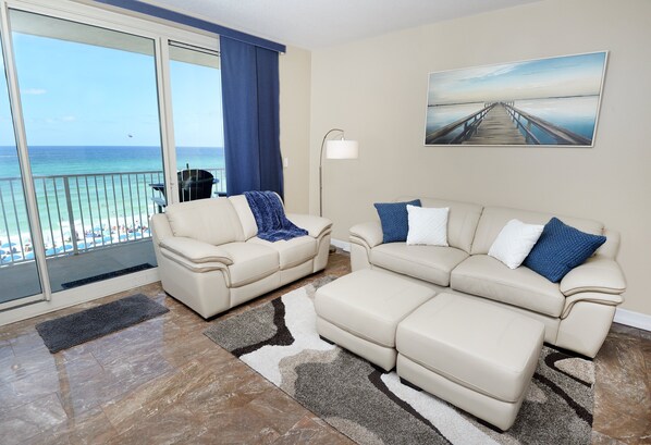 Living room with Full size sleeper sofa and loveseat with ottomans