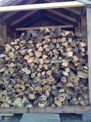 Our wood shed for the outdoor fire pit was fully stacked in June