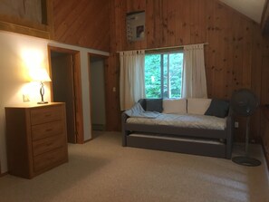 Upper level loft with twin day bed and trundle
