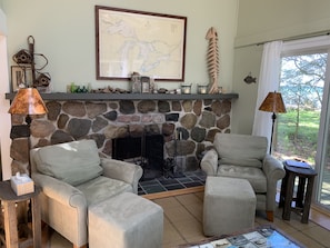 living room with wood-burning fireplace