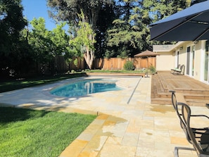 The backyard is fully landscaped
