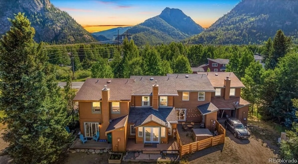 Rear Aerial looking West (unit with hot tub and fence)