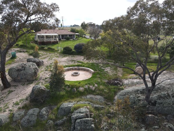 The house and firepit area