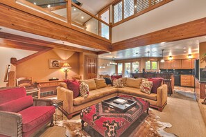 Living Room with Comfortable Furnishings and a Vaulted Ceiling