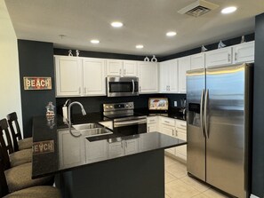 A Kitchen with all the amenities to cook a great meal.
