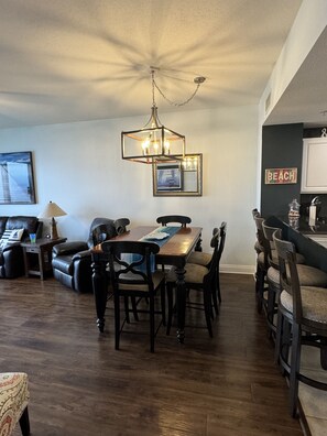 Six Bar hieght chairs.  An extra table leave in the master closet.  