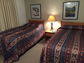 Two twin beds in master bedroom