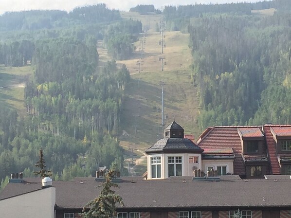 Vail Mountain and tops of Vail Square and Arabelle from the patio