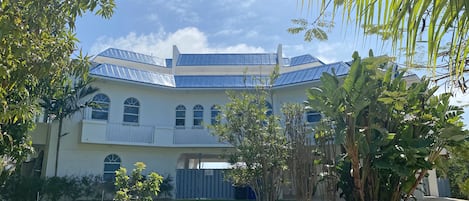 view of home from street. Plenty of parking with circular driveway