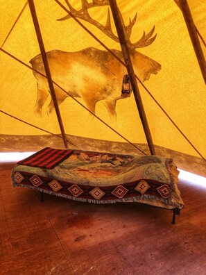 3 single beds in tipi and extra cots can be set up if needed