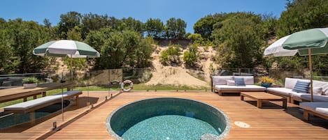 Gas heated mineral plunge pool over looking the sandune