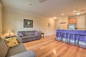 Serve apps and drinks on the spacious kitchen bar before the game.