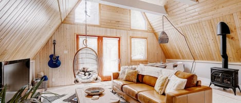 Main living area with bright light and mountain views