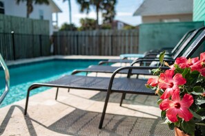 The Seascape pool is just behind the home and is shared by the two units.