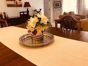  Mahogany dining table seats eight comfortably 