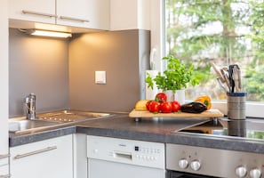 Kitchen in holiday home "Das kleine Haus"